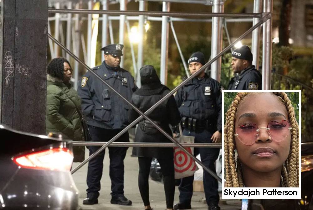 Anggota polis mengawal pintu masuk apartment didiami Patterson dan ibunya yang terletak di Bronx, New York. - Foto: Agensi