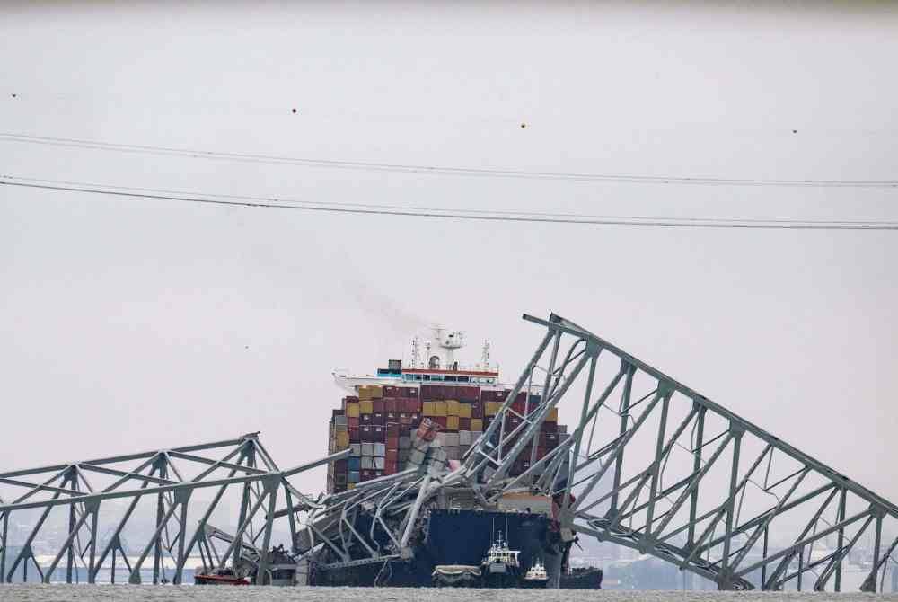 Kapal kontena melanggar Jambatan Francis Scott Key menyebabkan ia runtuh pada Selasa. Foto AFP