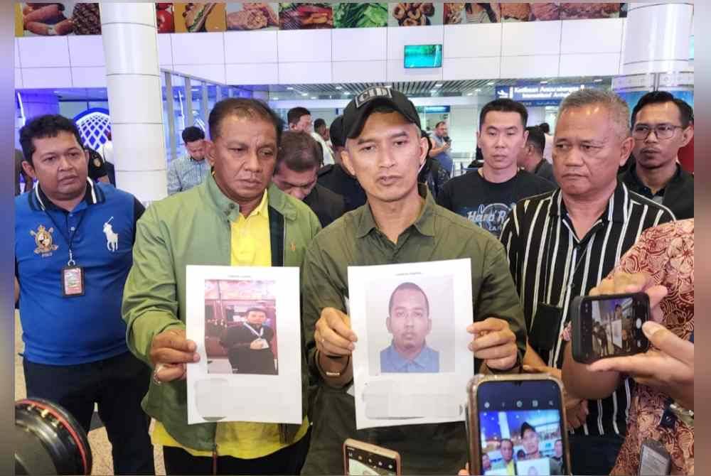 Mohd Shuhaily (dua dari kanan) dan Ketua Jabatan Siasatan Jenayah Selangor, Senior Asisten Komisioner Baharudin Mat Taib menunjukkan gambar suspek yang diburu dalam kejadian kes tembakan di KLIA pada Ahad.