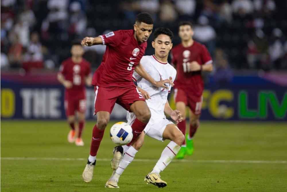 Aksi antara pemain Qatar dan Indonesia dalam perlawanan Kumpulan A Piala Asia B-23. FOTO AFC