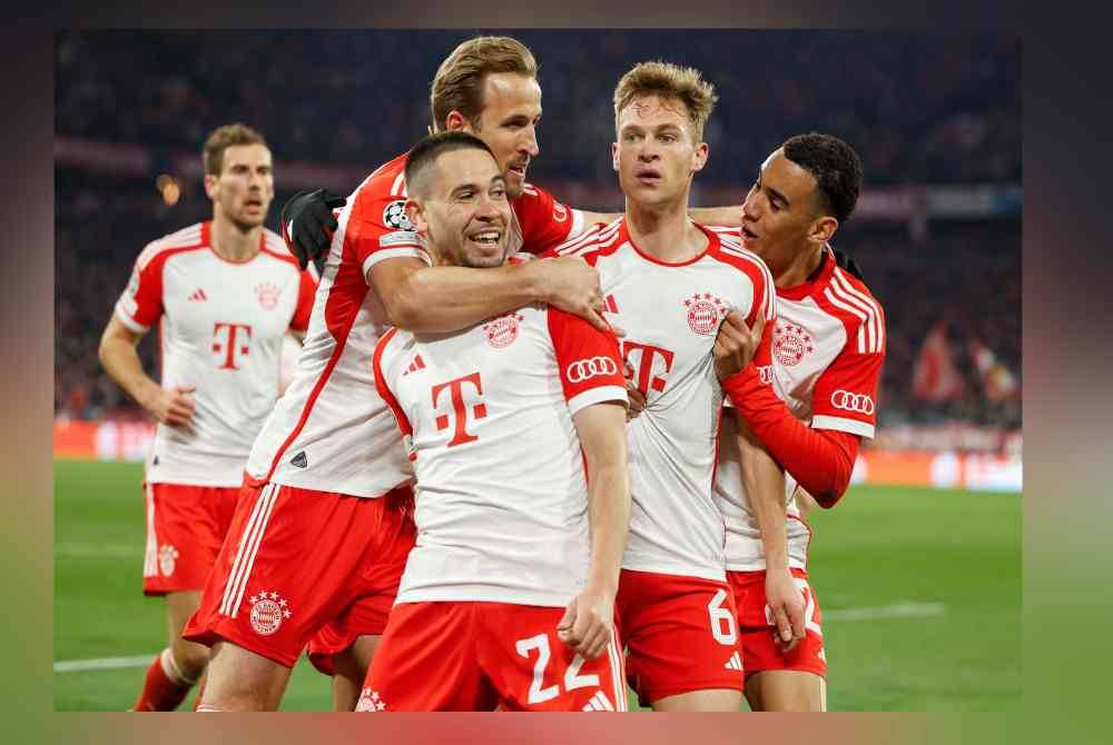 Joshua Kimmich (dua, kanan) meraikan jaringannya ketika menentang Arsenal. Foto AFP