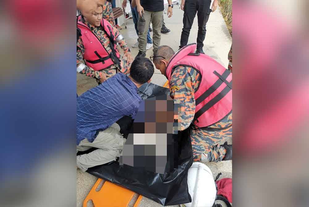 Mayat mangsa yang dijumpai di dasar tasik telah diserahkan kepada pihak polis untuk tindakan lanjut. Foto: ihsan Bomba Perak