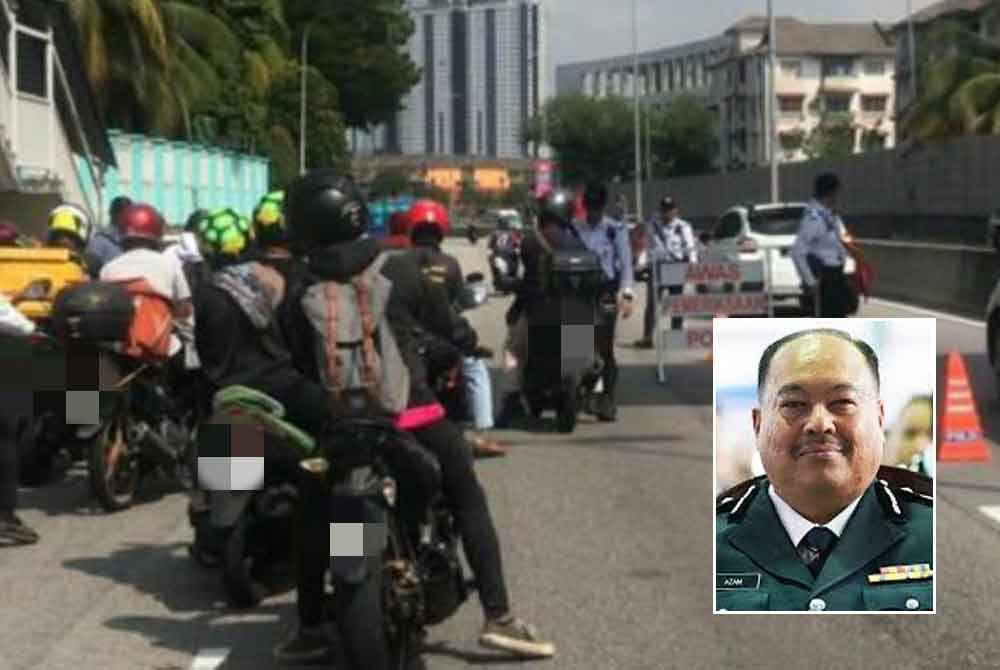 Anggota dari Bahagian Siasatan Penguatkuasaan Trafik (BSPT) Daerah Ampang Jaya membuat sekatan jalan raya di Jalan Pandan Indah di sini, pada Selasa. Gambar kecil: Mohd Azam