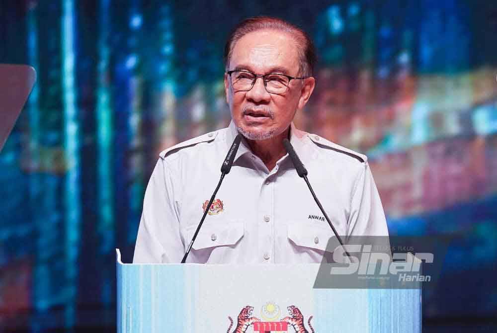 Anwar menyampaikan ucapan pada Majlis Sambutan Hari Pekerja 2024 di Pusat Konvensyen Antarabangsa Putrajaya (PICC), pada Rabu. Foto Sinar Harian-Rosli Talib