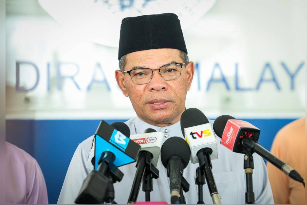 Saifuddin ketika sidang media pada Majlis Sambutan Hari Raya Aidilfitri Bersama Menteri Dalam Negeri di Maktab Polis Diraja Malaysia Kuala Kubu Baharu, hari ini. Foto Bernama