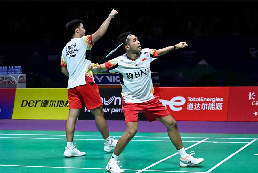 Fajar Alfian-Daniel Marthin menewaskan Dong-ju-Won-ho di pentas suku akhir Piala Thomas 2024 di Chengdu pada Jumaat. Foto AFP