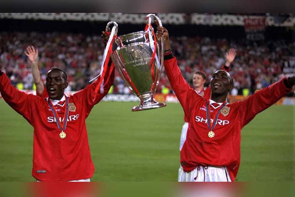 Yorke (kanan) dan Cole membantu United meraih gelaran treble pada edisi 1999. Foto Agensi