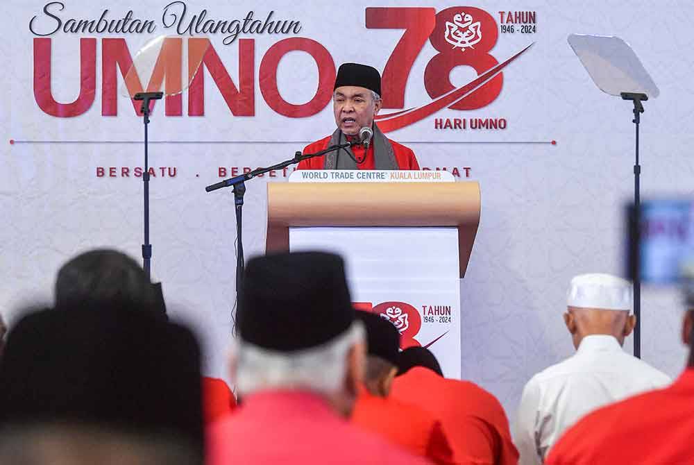 Presiden UMNO Datuk Seri Ahmad Zahid Hamidi menyampaikan ucapan ketika hadir pada Sambutan Ulang Tahun UMNO ke-78 di Pusat Dagangan Dunia Kuala Lumpur (WTCKL) pada Sabtu. Foto Bernama