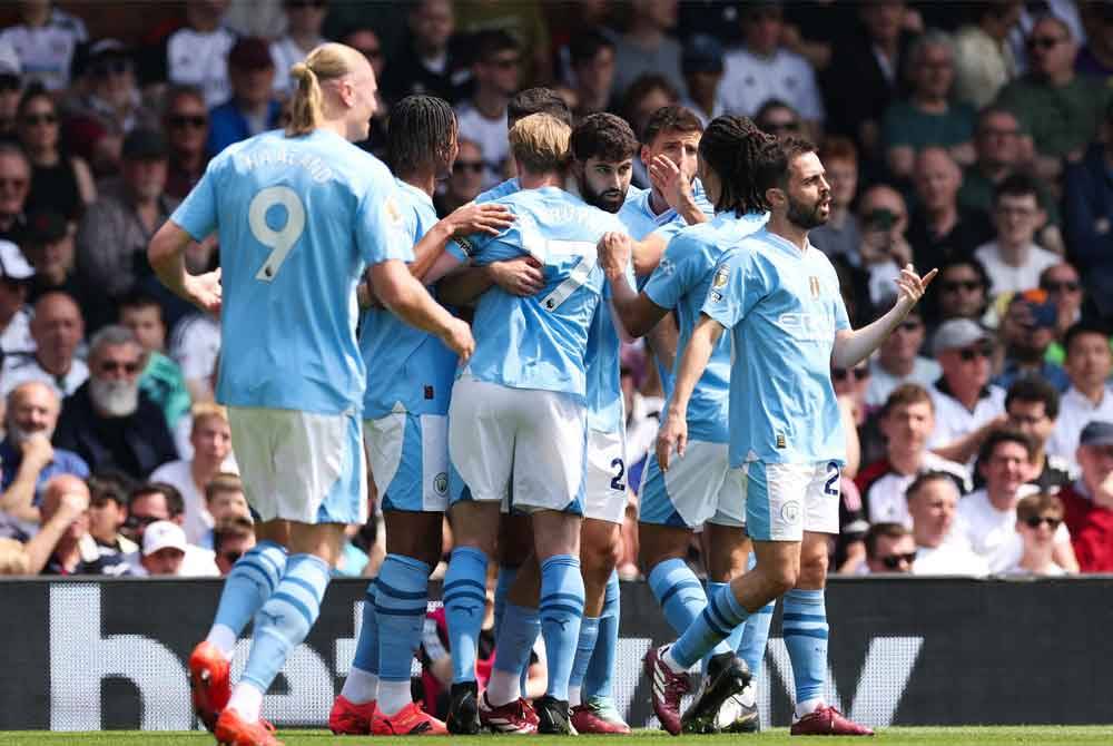 City mengejar kejuaraan EPL keempat berturut-turut. Foto AFP