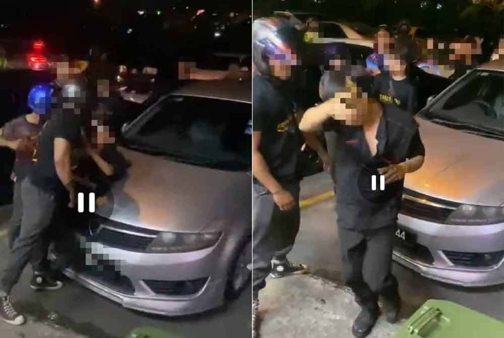 Tangkap layar video tular memaparkan seorang pemandu kereta dipukul selepas didakwa memandu secara melulu dalam kejadian di hadapan sebuah restoran dekat Bandar Bukit Tinggi pada Isnin.