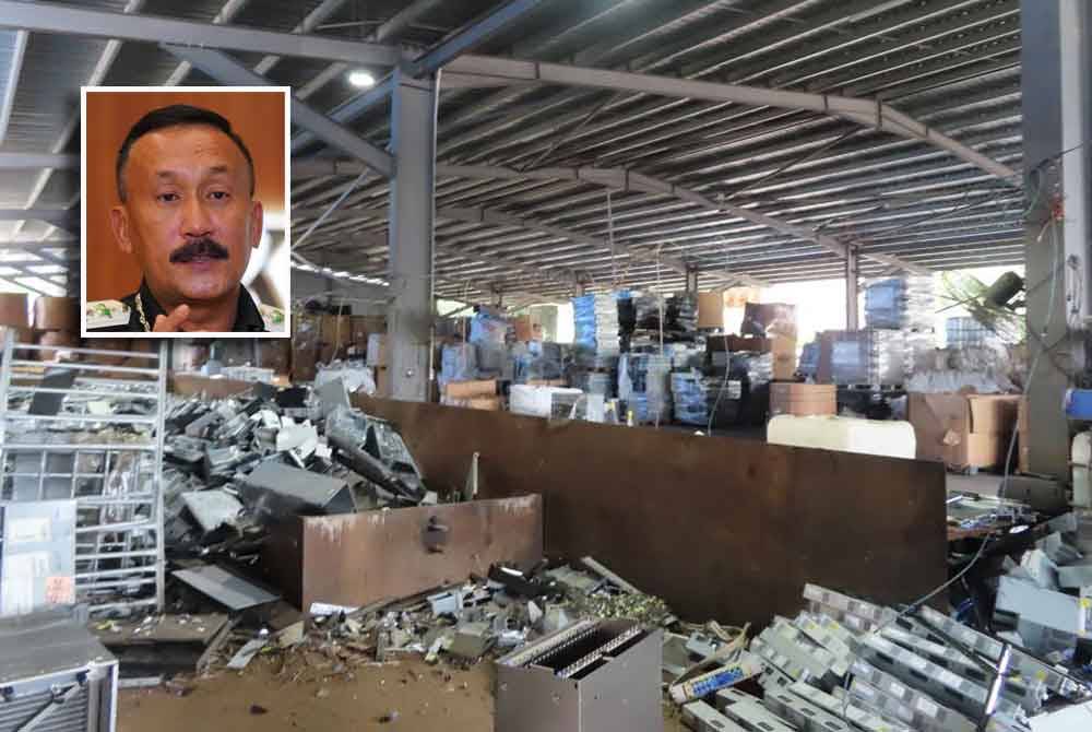 Sebuah kilang e-waste di Klang digempur JIM pada Khamis. Gambar kecil: Ruslin