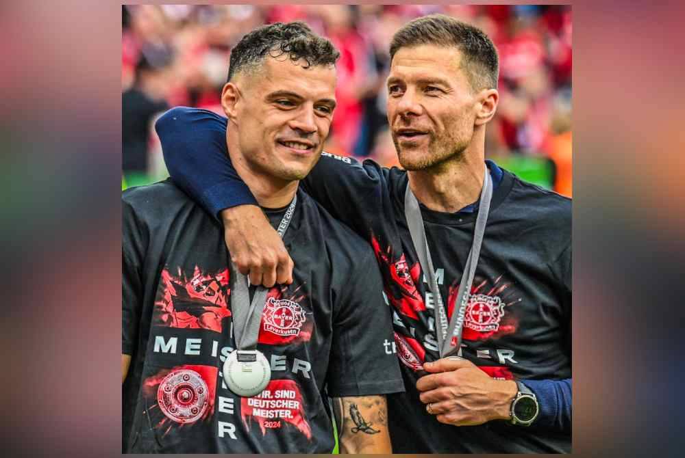 Alonso dan Xhaka meraikan kejayaan Leverkusen merangkul kejuaraan Bundesliga. Foto Agensi