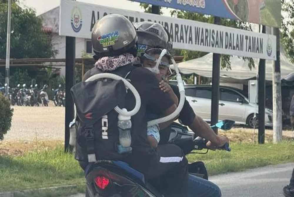 Tular dalam media sosial memaparkan si ibu menggendong bayinya berusia 11 bulan yang mengalami masalah paru-paru serta bergantung kepada alat bantuan pernafasan menaiki motosikal ditunggang bapa bayi itu ke hospital.