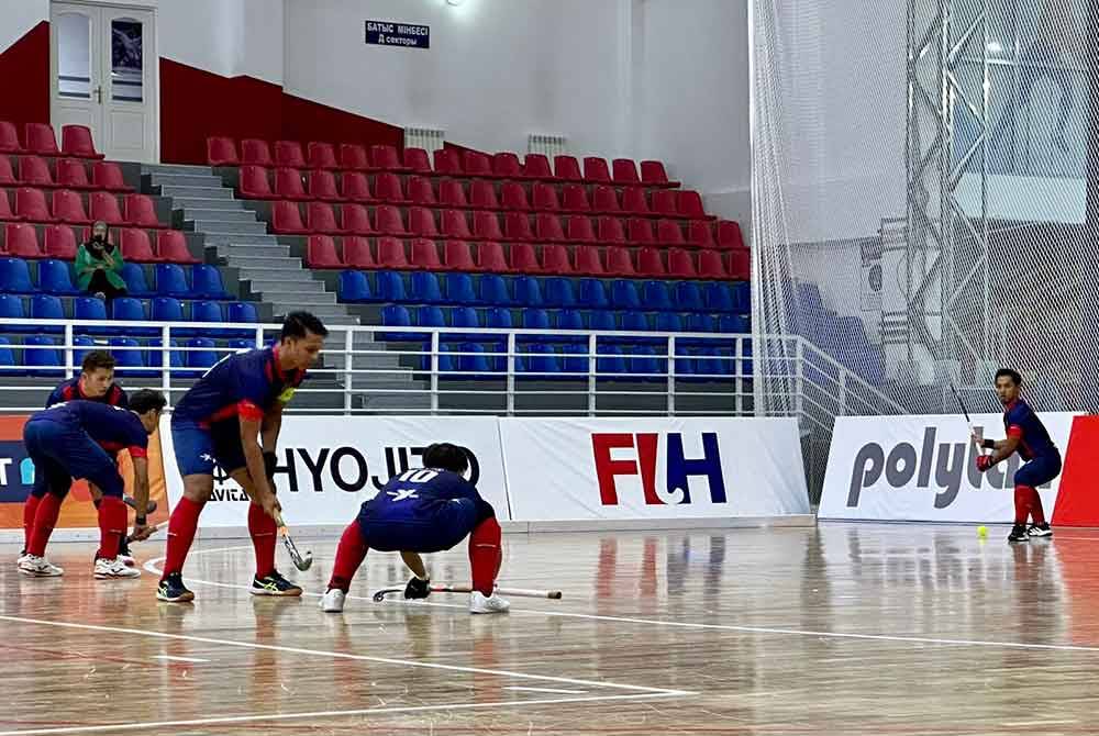 Aksi Malaysia menentang Thailand dalam perlawanan Kumpulan C.