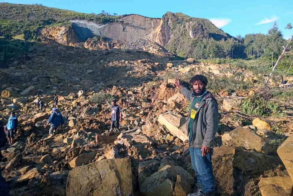 Lebih 100 orang dikhuatiri terkorban dalam kejadian tanah runtuh di Papua New Guinea. Foto AFP