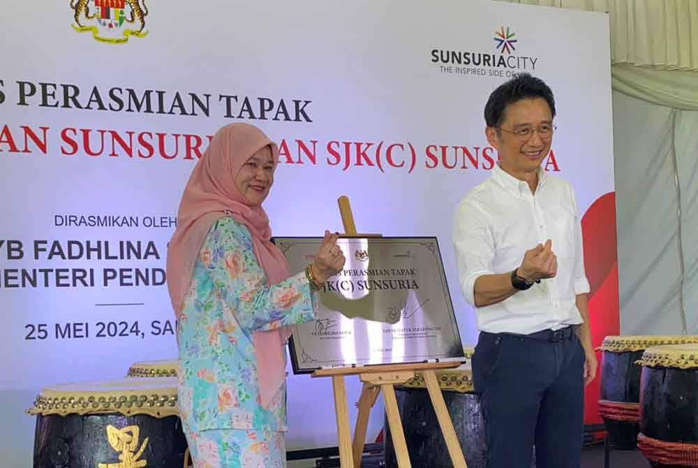 Fadhlina dan Leong Yap ketika merasmikan Tapak Projek Hab Pendidikan dan Sekolah Jenis Kebangsaan Cina (SJKC) Sunsuria, di sini pada Sabtu.