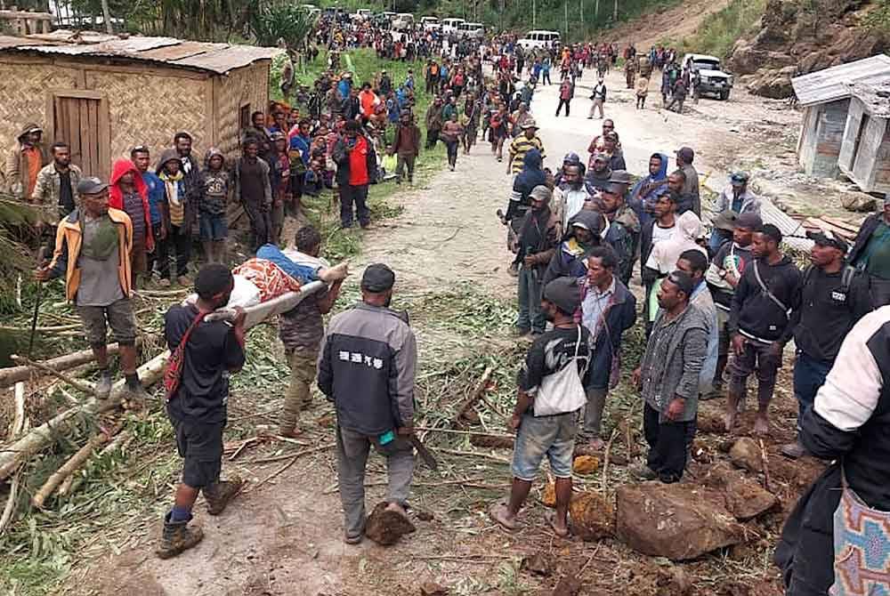 Jumlah korban akibat tanah runtuh di kawasan terpencil di utara Papua New Guinea meningkat kepada lebih 300 orang. Foto AFP