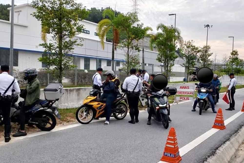 Polis melaksanakan Op Motosikal di laluan motosikal Lebuhraya SUKE, Ampang pada Selasa.