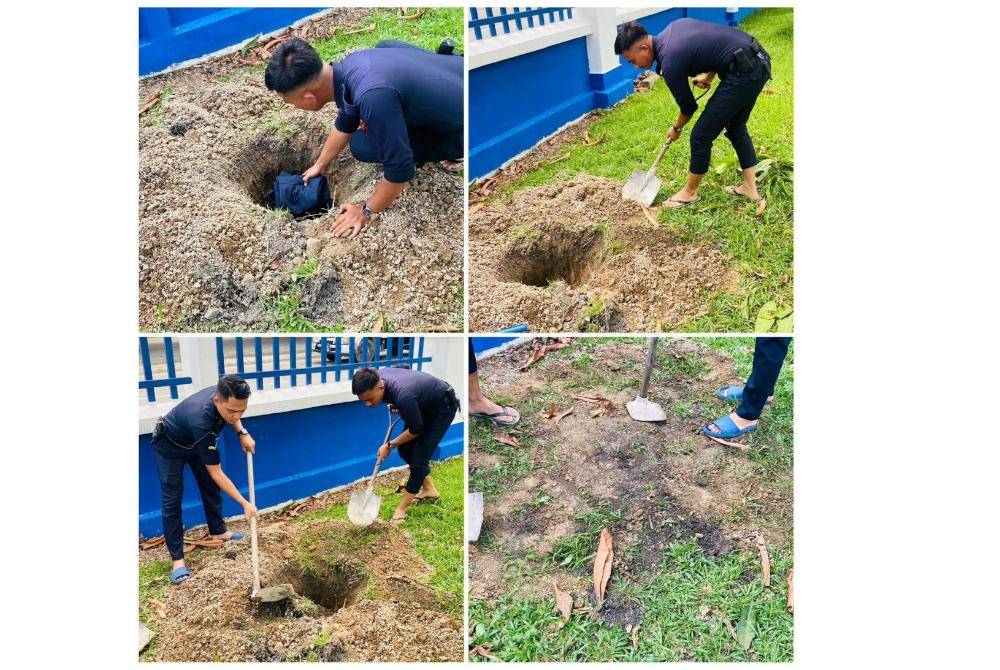 Rakan setugas arwah Muhamad Syafiq menanam uniform terakhirnya di Balai Polis Ulu Tiram pada Jumaat. Foto Ihsan Nurul Syuhada