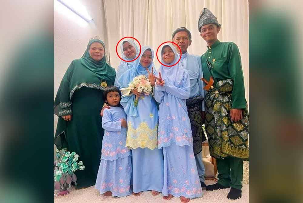 Gambar kenangan Rohayati (kiri) dan suami bersama Allahyarham Intan Dasillah (dua dari kiri) dan Intan Nor Khairina (tiga dari kanan) yang maut dalam nahas di Jalan Simpang Pulai-Cameron Highlands dekat Kampung Kerawat pada Sabtu.