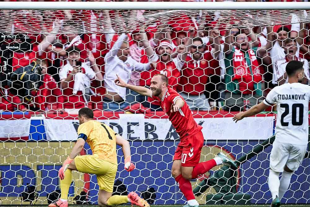 Eriksen memastikan Denmark memimpin separuh masa pertama ketika berdepan Slovenia. Foto Agensi