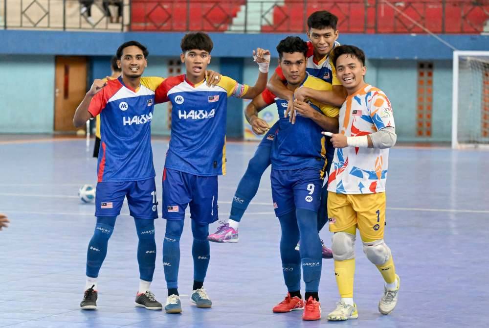 Pemain Malaysia meraikan kejayaan mara ke perlawanan akhir futsal pada Sabtu.