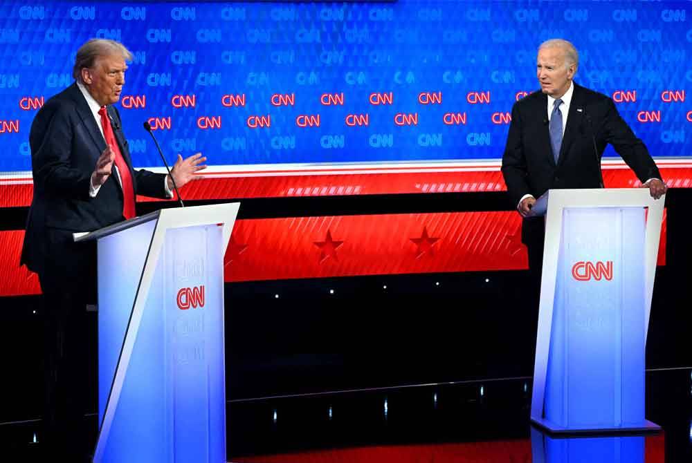 Proses debat pertama calon Presiden AS antara Joe Biden dan Donald Trump perlu dijadikan sebagai contoh untuk negara kita. Foto AFP