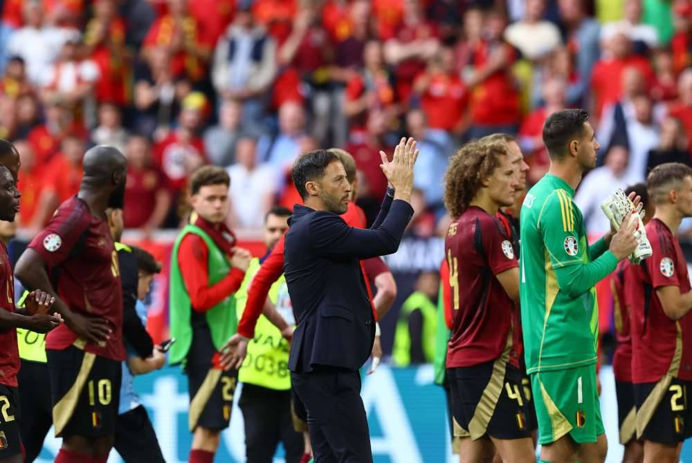 Reaksi kecewa Tedesco (tengah) serta pemain setelah Belgium gagal mara ke suku akhir Euro di Dusseldorf pada Selasa. Foto EPA