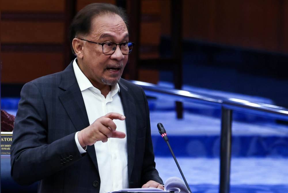 Anwar yang juga Menteri Kewangan ketika Persidangan Dewan Rakyat sempena Mesyuarat Kedua, Penggal Ketiga Parlimen Kelima Belas di Bangunan Parlimen, pada Selasa. Foto Bernama