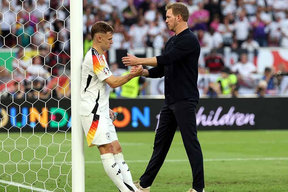 Biarpun tewas kepada Sepanyol, Nagelsmann (kanan) tetap bangga dengan aksi pemain Jerman. Foto EPA