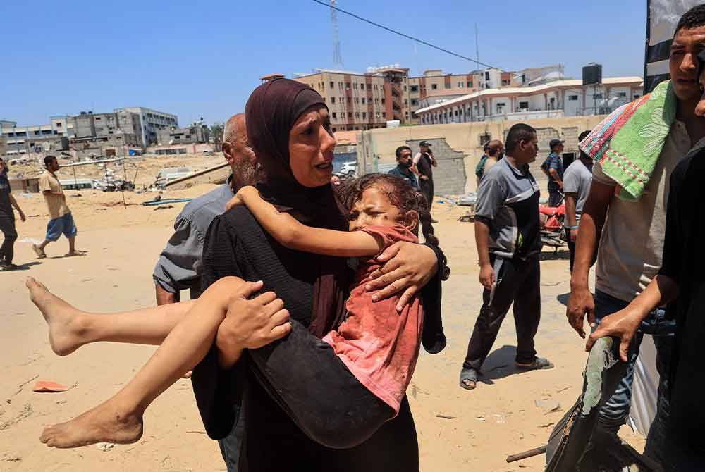 Kementerian Kesihatan di Genting Gaza mendakwa lebih 70 terkorban manakala kira-kira 289 lagi cedera dalam kempen pengeboman ganas terbaharu dilancarkan rejim Zionis ke atas &#039;bandar khemah&#039; di Rafah.Foto AFP