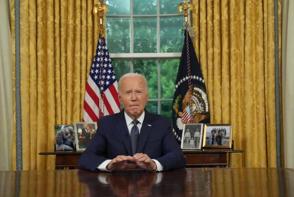 Biden menyeru agar rakyat negara itu bersatu susulan cubaan membunuh terhadap Trump. Foto AFP