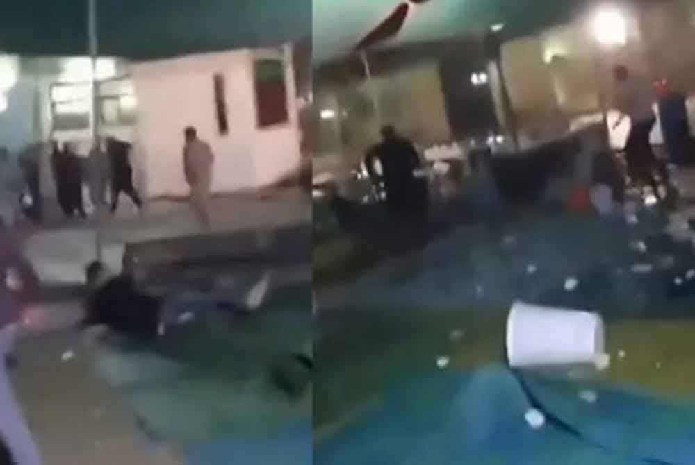 Tangkap layar video insiden tembakan di sekitar masjid di kawasan Wadi al-Kabir di ibu negara Muscat