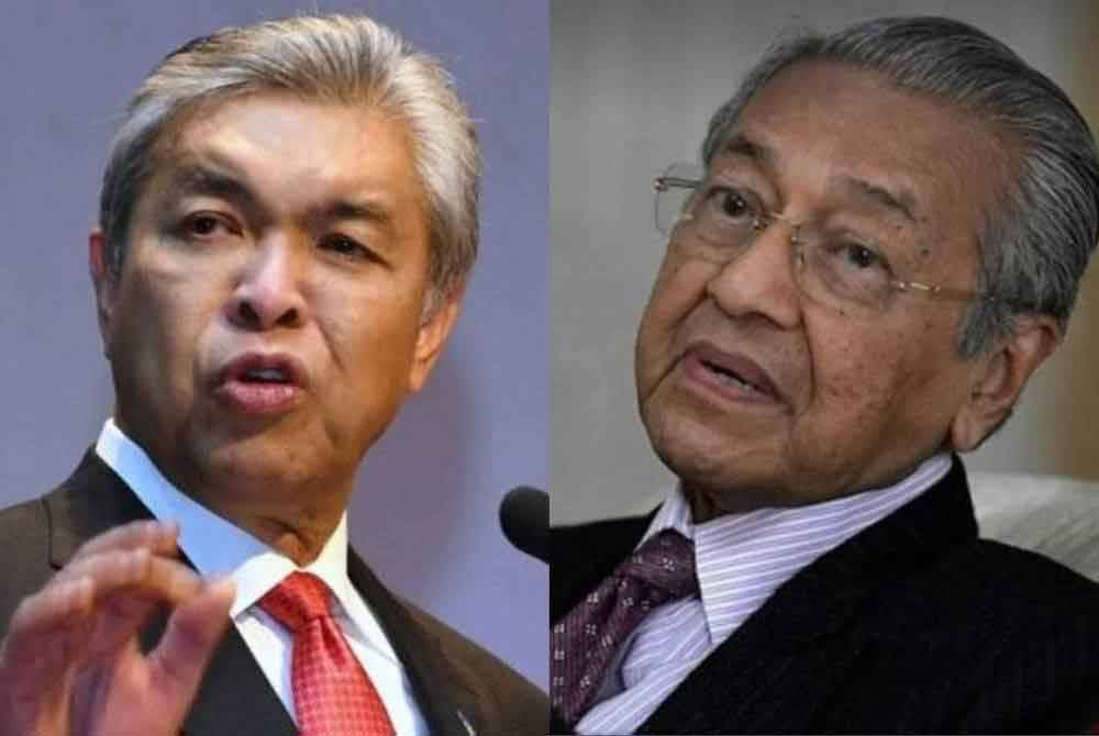 Ahmad Zahid (kiri) dan Dr Mahathir