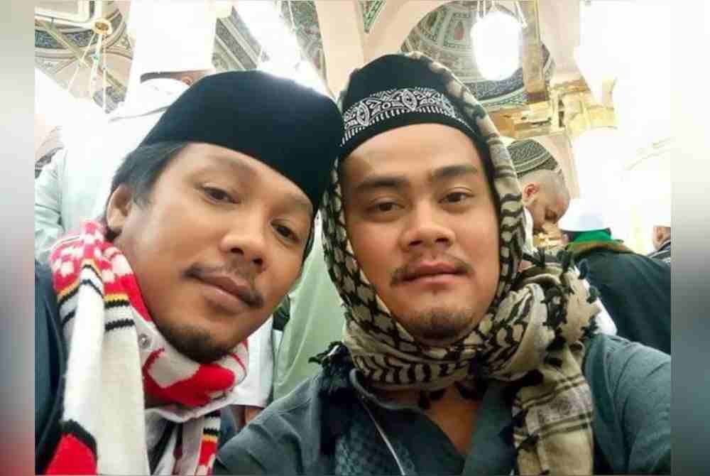 Mangsa (kiri) bersama adik lelakinya. Foto Agensi