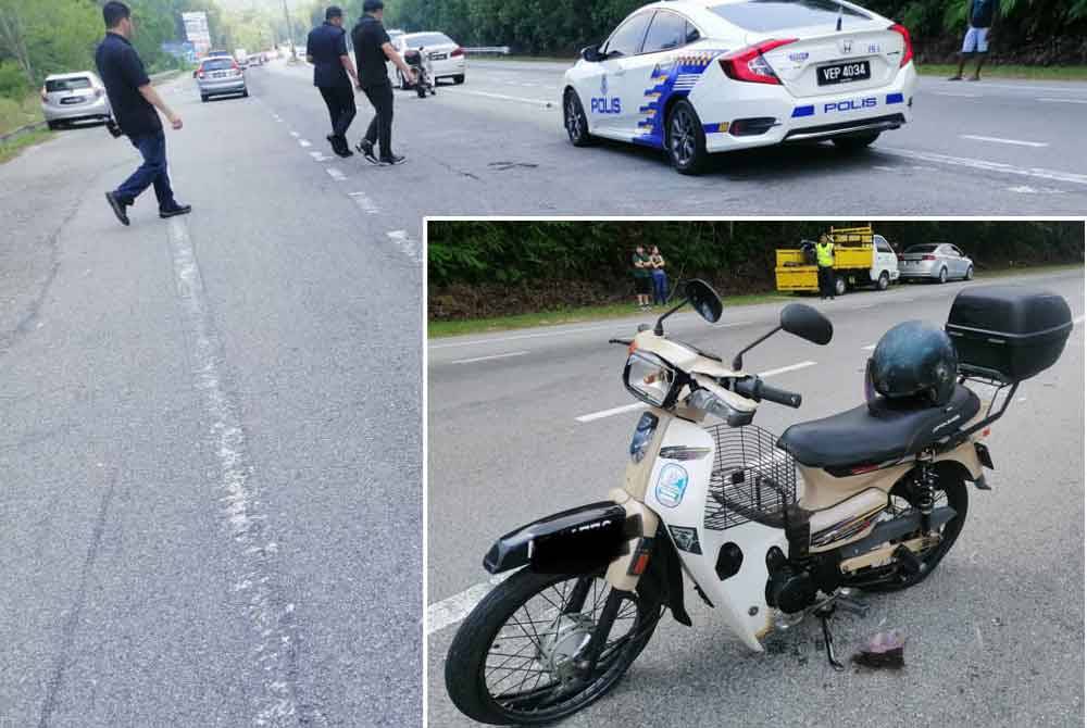 Pegawai penyiasat IPD Ipoh memeriksa lokasi kejadian kemalangan membabitkan motosikal dan sebuah kereta di Jalan Ipoh-Lumut di sini pada Rabu.