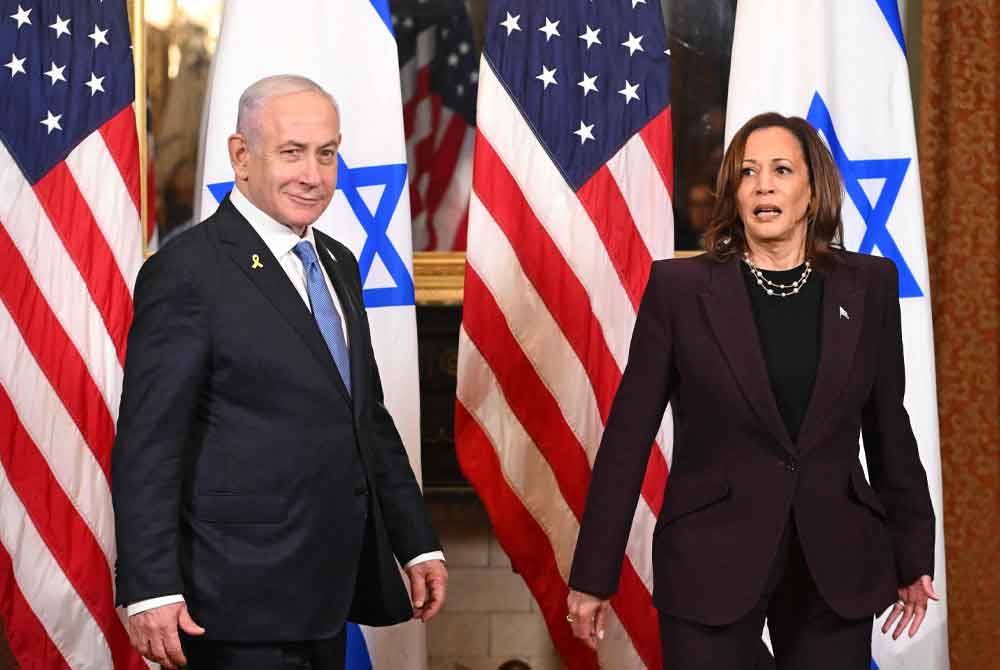 Kamala Harris mengadakan pertemuan tertutup bersama Benjamin Netanyahu di Washington pada Khamis. Foto AFP