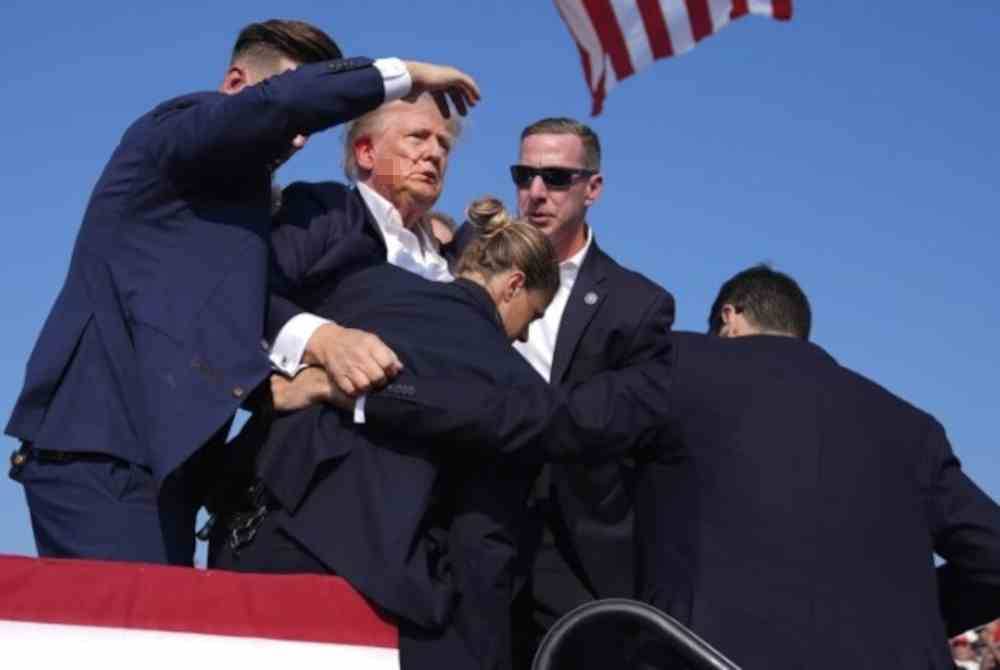 Thomas Matthew Crooks melepaskan tembakan ke arah Trump semasa satu himpunan kempen di Butler County pada 13 Julai, mengenai telinga kanan beliau. Foto Xinhua