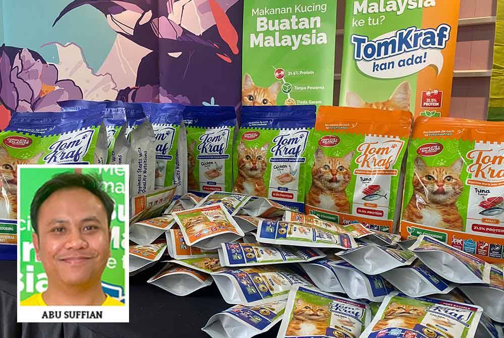 Orang ramai berpeluang mendapatkan pek percubaan makanan kucing secara percuma di reruai Tomkraf.