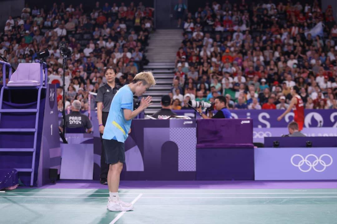 Jin Wei memohon maaf gagal memberi kemenangan buat rakyat Malaysia. Foto MOM.