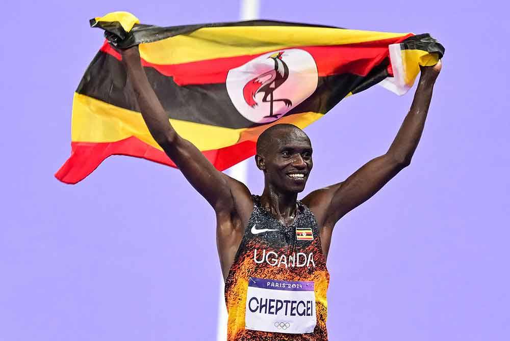 Joshua Cheptegei meraih emas dalam acara 10,000 meter (m) lelaki pada Sukan Olimpik Paris. Foto: AFP