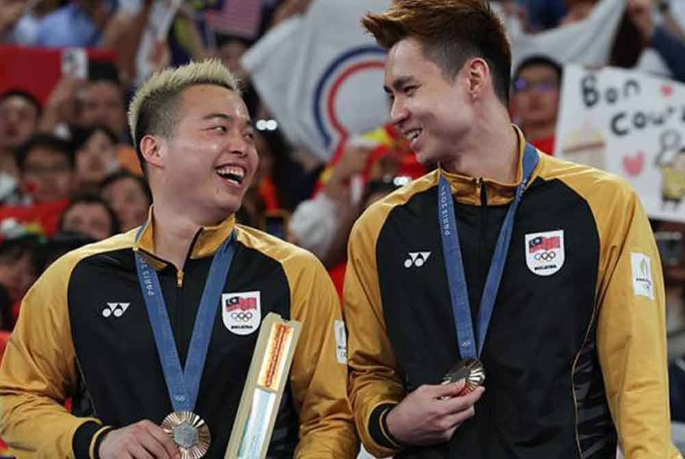 Aaron berkata, walaupun mereka bangga dengan kejayaan meraih pingat buat negara, tetapi tidak berniat untuk meraikannya secara besar-besaran kerana sasaran sebenar mereka adalah pingat emas. - Foto Bernama