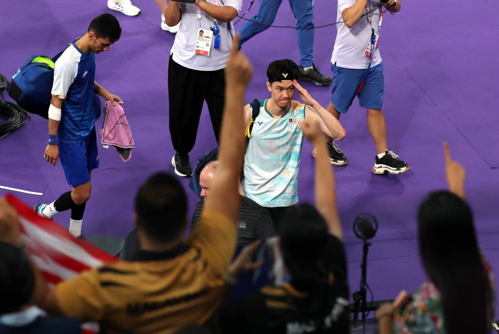 Zii Jia selepas menewaskan pemain India Lakshya Sen dalam penentuan pingat gangsa acara badminton lelaki pada Sukan Olimpik Paris 2024 di Arena Porte De La Chapelle pada Isnin. Foto Bernama