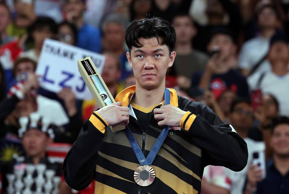 Hannah mengajak rakyat Malaysia meraikan pencapaian Zii Jia yang memenangi pingat gangsa kedua negara di Sukan Olimpik Paris 2024. Foto Bernama