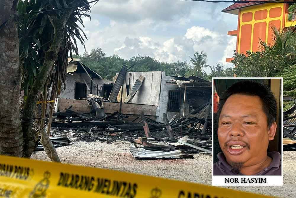 Keadaan rumah yang terbakar mengorbankan tiga nyawa di Pagoh pada awal pagi Jumaat.