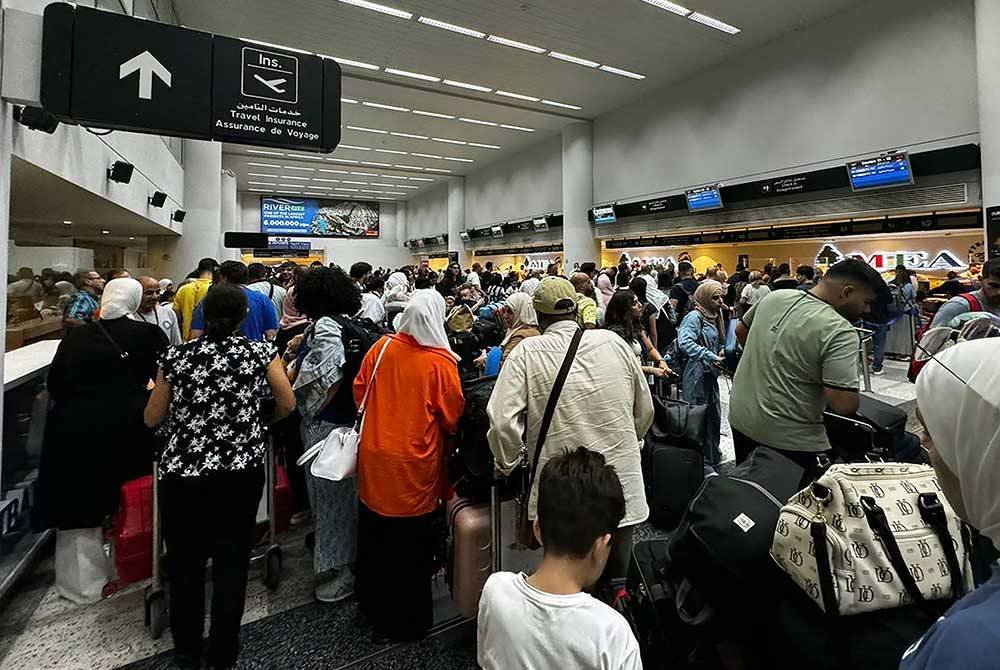 Konflik yang dibimbangi merebak luas menyebabkan China menggesa rakyatnya meninggalkan Lubnan. Foto AFP