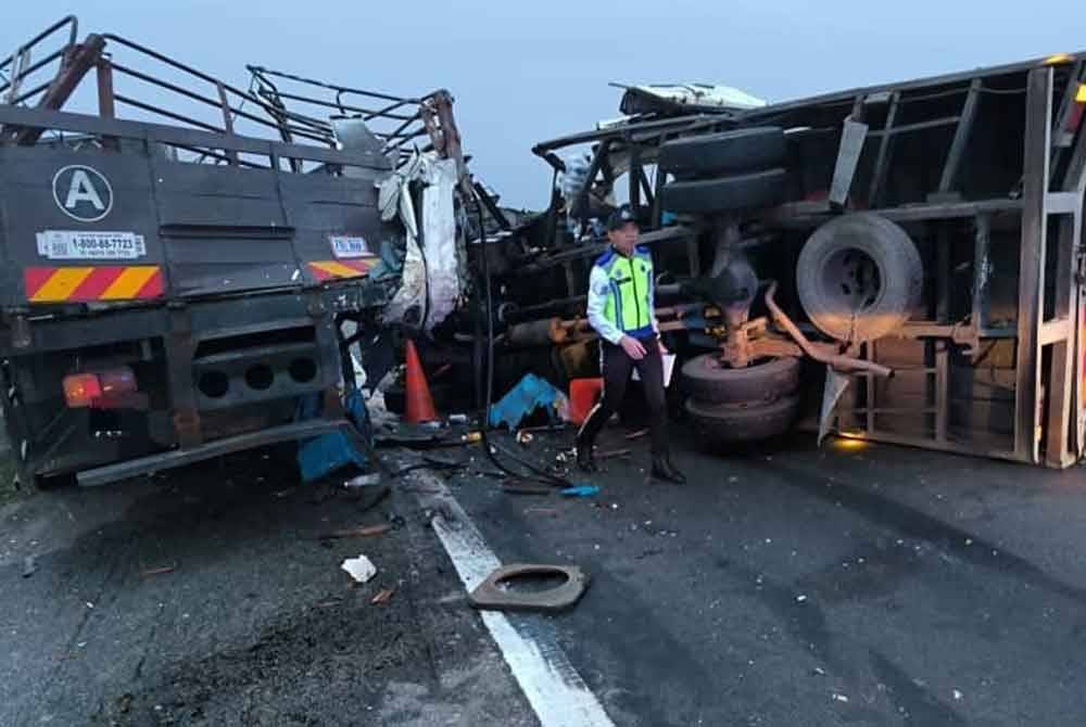 Keadaan dua lori yang terlibat dalam kemalangan berkenaan.