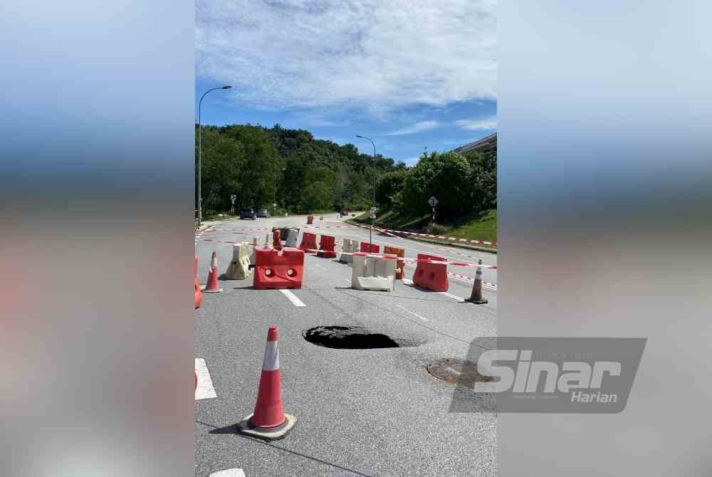 Lokasi tanah mendap di hadapan Pangsapuri Seri Seraya Puncak Bestari, di sini pada Sabtu. Foto Sinar harian/AISYAH BASARUDDIN