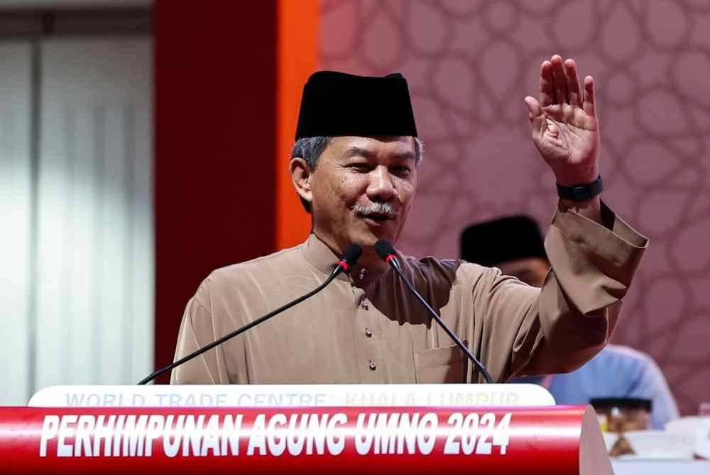 Mohamad berucap pada sesi perggulungan sempena Perhimpunan Agung UMNO 2024 di Dewan Merdeka hari ini. Foto Bernama