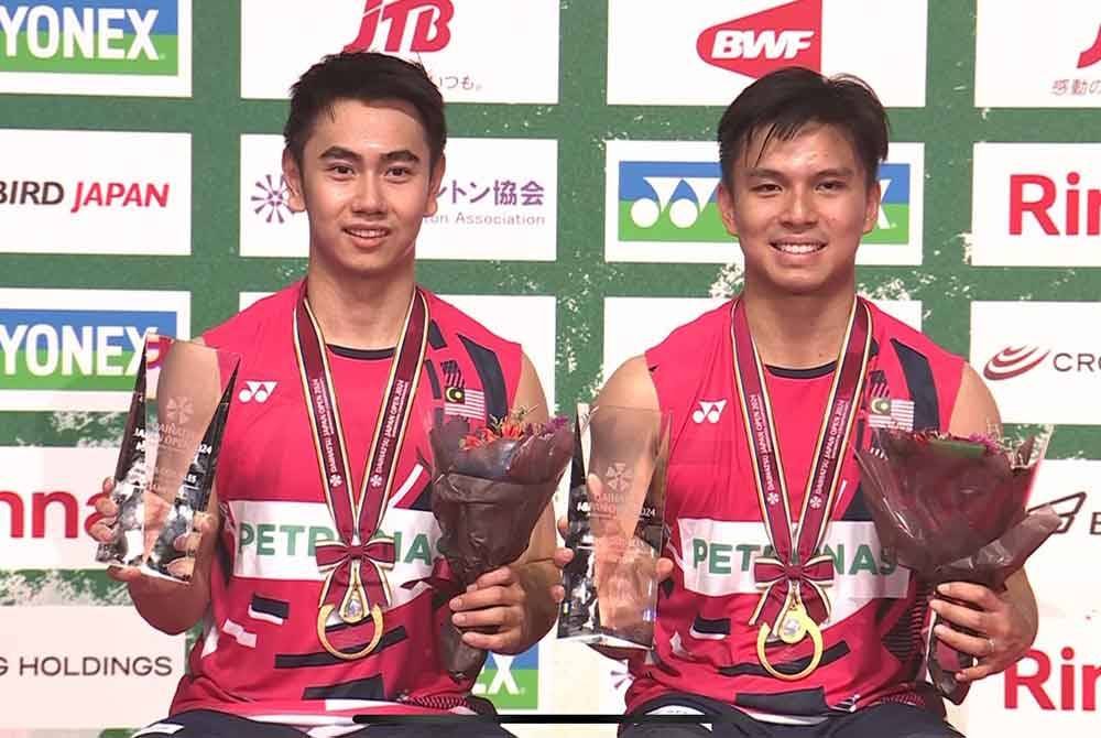 Sze Fei-Nur Izzuddin meneruskan prestasi cemerlang apabila mengungguli kejuaraan badminton Terbuka Jepun pada Ahad. Foto Agensi